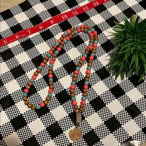Hand assembled beaded necklace bicycle